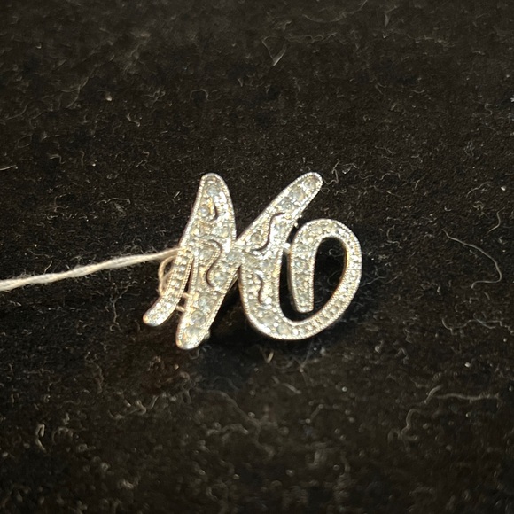 Monet Jewelry - Elegant Silver Monet Initial Brooch with Rhinestones
